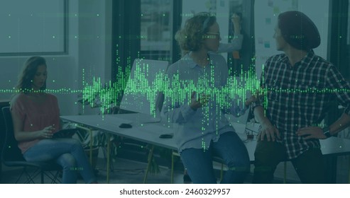 Image of data processing over diverse female and male colleagues smiling at office. Business data technology concept