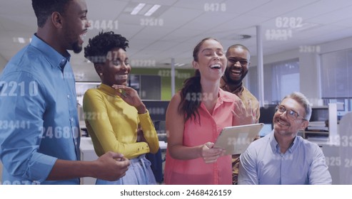 Image of data processing over diverse business people in office. Global business and digital interface concept, digitally generated image.