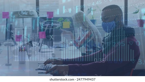 Image of data processing over diverse business people with face masks in office. Global business and digital interface concept digitally generated image.
