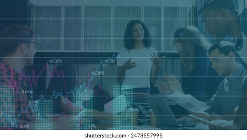 Image of data processing over diverse business people working in office. Global business, finances, computing and data processing concept digitally generated image. - Powered by Shutterstock