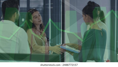 Image of data processing over diverse business people talking. Global business and digital interface concept digitally generated image.