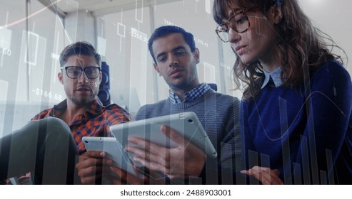 Image of data processing over diverse colleagues discussing over digital tablet at office. Business data and analytics technology concept