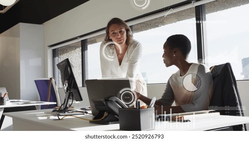 Image of data processing over diverse business people in office. Global finance, business, connections, computing and data processing concept digitally generated image.