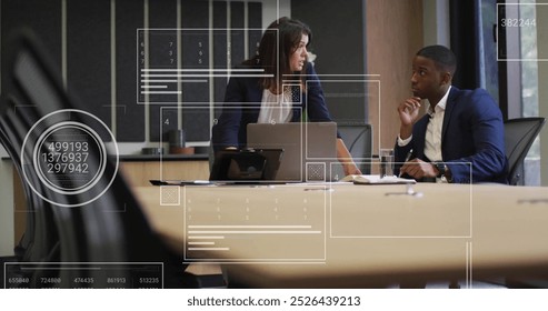 Image of data processing over diverse male and female business colleague in meeting. Office, teamwork, business, digital interface and communication, digitally generated image.