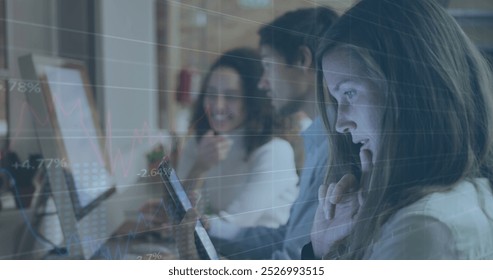 Image of data processing over diverse business people using tablet. global business and digital interface concept digitally generated image.