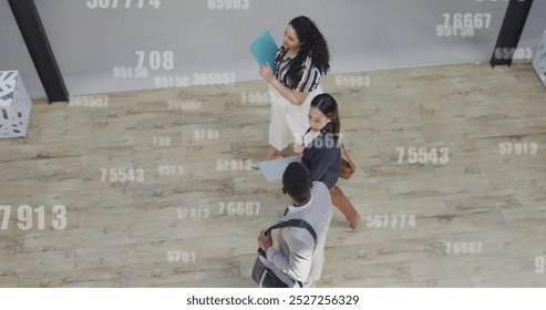 Image of data processing over diverse business people in office. Global finance, business, connections, computing and data processing concept digitally generated image.