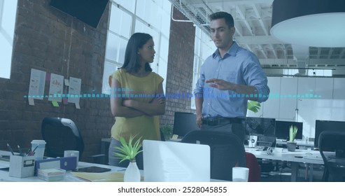 Image of data processing over diverse business people in office. Global business and digital interface concept digitally generated image.