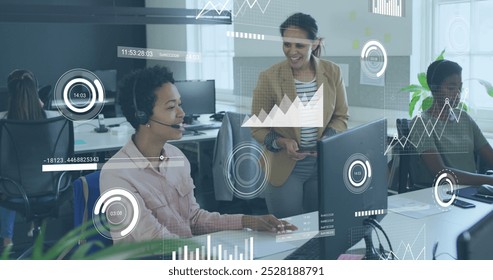 Image of data processing over diverse business people in office. Global business and digital interface concept, digitally generated image.