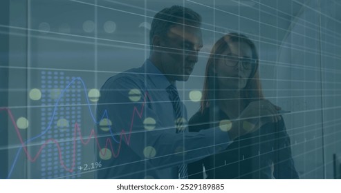 Image of data processing over diverse businessman and businesswoman discussing over glass board. Business data technology concept