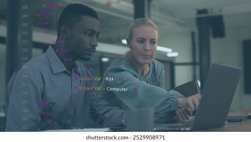 Image of data processing over diverse colleagues using laptop and tablet in office. Business, communication, technology, computing and digital interface concept digitally generated image.