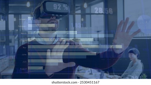 Image of data processing over diverse business people in office. Global business and digital interface concept digitally generated image.