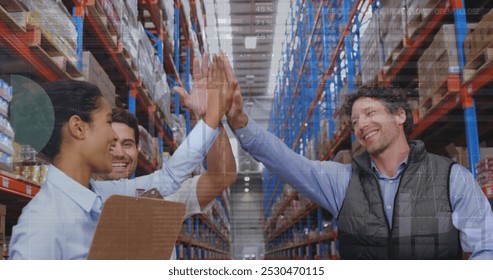 Image of data processing over diverse workers in warehouse. global business and digital interface concept digitally generated image. - Powered by Shutterstock