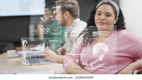 Image of data processing over diverse colleagues having meeting in office. Business, communication, technology, computing and digital interface concept digitally generated image. - Powered by Shutterstock - Get 15% off with code: PIKWIZARD15