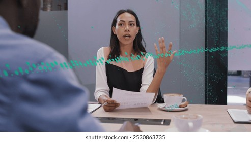 Image of data processing over diverse business people in office. Global business and digital interface concept digitally generated image.