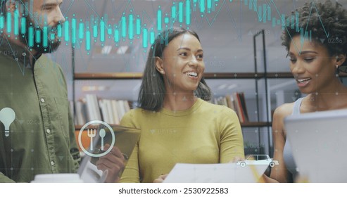 Image of data processing over diverse business people working at office. Global business and digital interface concept digitally generated image.