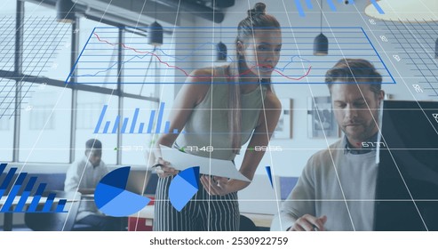 Image of data processing over diverse business people working at office. Global business and digital interface concept digitally generated image.
