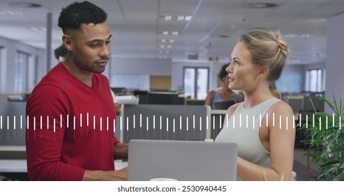 Image of data processing over diverse business people in office. Global business and digital interface concept digitally generated image.