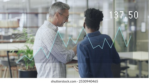 Image of data processing over diverse business people in office. Global business and digital interface concept digitally generated image.