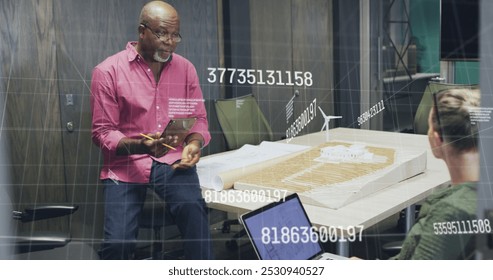 Image of data processing over diverse business people in office. Global business and digital interface concept digitally generated image.