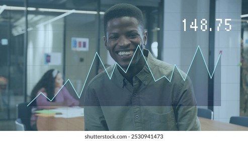 Image of data processing over diverse business people working in office. Global business and digital interface concept digitally generated image.