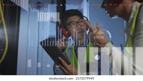 Image of data processing over diverse it engineers by computer servers. Global finance, business, connections, computing and data processing concept digitally generated image. - Powered by Shutterstock - Get 15% off with code: PIKWIZARD15