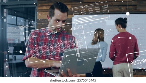 Image of data processing over diverse colleagues working in office. Business, technology and digital interface concept digitally generated image.
