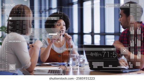 Image of data processing over diverse colleagues discussing work in office. Global business, computing and digital interface concept digitally generated image.