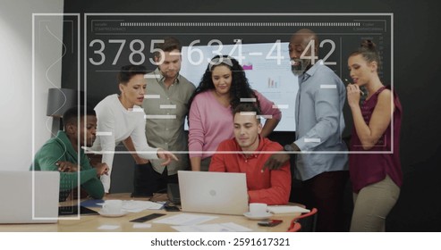 Image of data processing over diverse business people in office. Global finance, business, connections, computing and data processing concept digitally generated image.