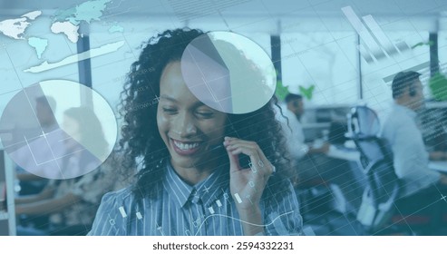 Image of data processing over diverse colleagues working in office. Business, technology and digital interface concept digitally generated image.