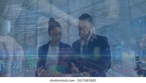 Image of data processing over diverse business people in office. global data processing, business, finance and economy concept digitally generated image.