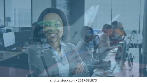 Image of data processing over diverse business people in office. global data processing, business, finance and economy concept digitally generated image.