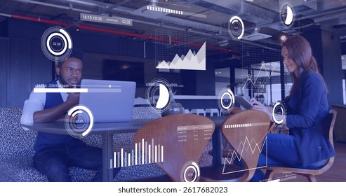 Image of data processing over diverse business people working in office. global business and digital interface concept digitally generated image.