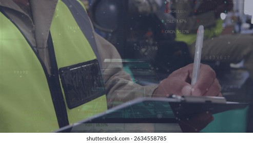 Image of data processing over diverse workers in warehouse. Global business and digital interface concept digitally generated image.