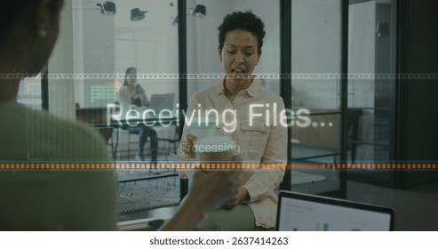 Image of data processing over diverse business people in office. Global business and digital interface concept digitally generated image.