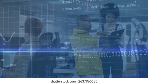Image of data processing over diverse male basketball players at sports image. Global business finances data processing and digital interface concept digitally generated image.