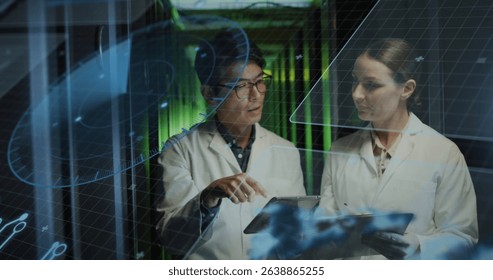 Image of data processing over diverse workers in server room. Global business and digital interface concept digitally generated image.