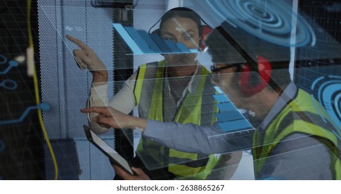 Image of data processing over diverse workers in server room. Global business and digital interface concept digitally generated image.