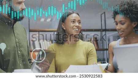 Image of data processing over diverse business people working at office. Global business and digital interface concept digitally generated image.