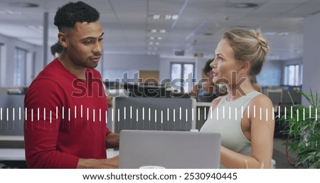 Image of data processing over diverse business people in office. Global business and digital interface concept digitally generated image.