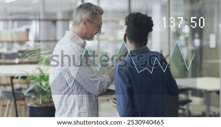 Image of data processing over diverse business people in office. Global business and digital interface concept digitally generated image.