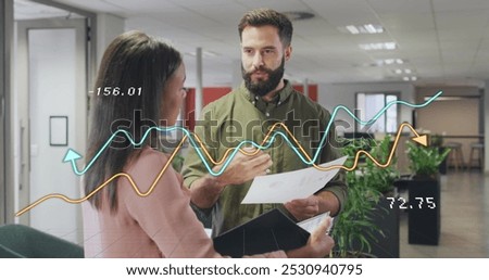 Image of data processing over diverse business people in office. Global business and digital interface concept digitally generated image.