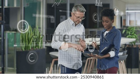 Image of data processing over diverse business people in office. Global business and digital interface concept digitally generated image.