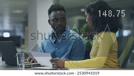 Image of data processing over diverse business people in office. Global business and digital interface concept digitally generated image.
