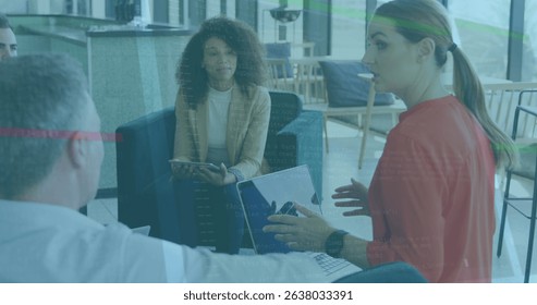 Image of data processing over group of diverse colleagues discussing together at office. Computer interface and business technology concept - Powered by Shutterstock - Get 15% off with code: PIKWIZARD15