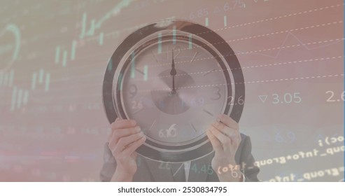 Image of data processing over hands with clock. Global education and digital interface concept digitally generated image.