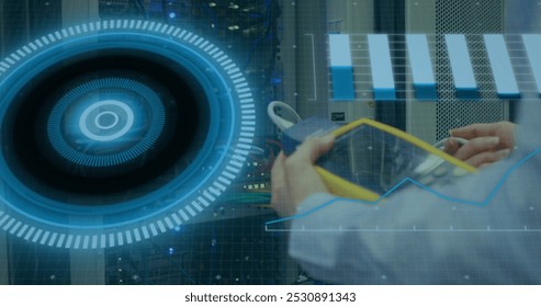 Image of data processing over hands of caucasian male engineer checking wires. computers, network, data processing, technology and digital interface concept digitally generated image.
