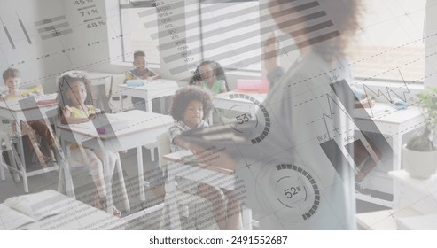 Image of data processing over happy diverse female teacher addressing pupils in class. Communication, school, childhood, education and learning, digitally generated image.