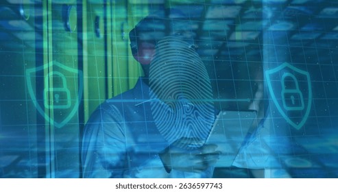 Image of data processing over male african american couple server room worker using headphones. Cloud computing concept digitally generated image.