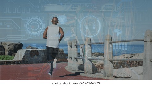 Image of data processing over rear view of african american senior man running on the promenade. Sports and fitness technology concept - Powered by Shutterstock