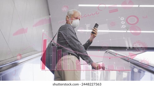 Image of data processing over senior man wearing face mask. global covid 19 pandemic and vaccination concept digitally generated image.